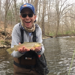 Image of a Client Fly Fishing the tulpehocken creek for trout with Top Water Trips