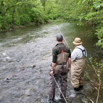 Top Water Trips Fly Fishing Guided Trips & Lessons in Pennsylvania Fly Fishing Guide Kevin Moriarty teaching on French Creek with Top Water Trips